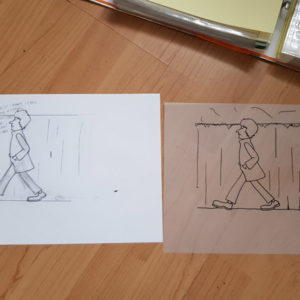 A drawing of a man walking and traced image