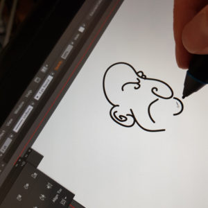 Drawing a cartoon face on a tablet screen