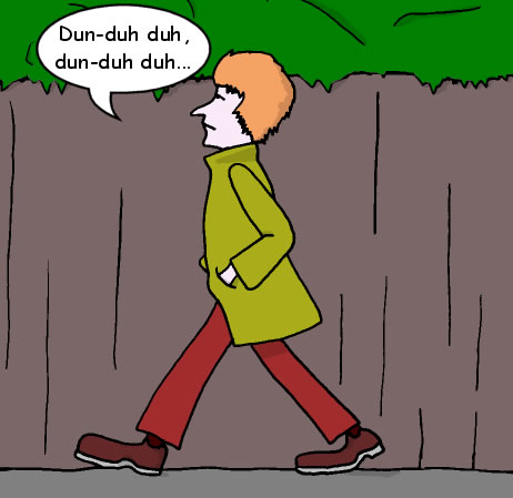 A man walks along singing to himself