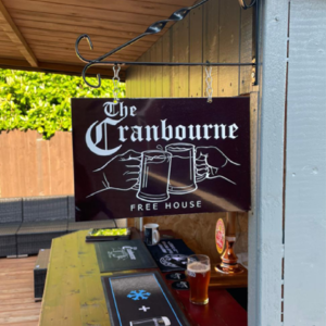 The Cranbourne pub sign on display at the side of the bar area